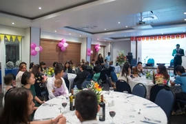 Cộng đồng người Việt Nam tại Mozambique kỷ niệm Ngày thống nhất đất nước và Quốc tế Lao động. (Ảnh: Dư Hưng/Vietnam+) 