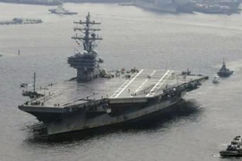 Tàu sân bay USS Ronald Reagan rời căn cứ hải quân Yokosuka gần Tokyo (Nhật Bản) ngày 8/10. (Nguồn: Kyodo/TTXVN)