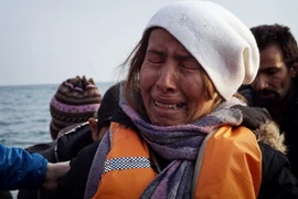 Người di cư tới đảo Lesbos, Hy Lạp ngày 20/3/2016. (Nguồn: AFP/TTXVN)