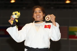 Nguyễn Thị Như Ý với tấm HCV duy nhất tại SEA Games 29 của Judo Việt Nam. (Ảnh: Quốc Khánh/TTXVN)