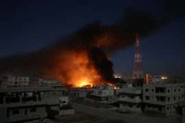 Khói bốc lên sau cuộc không kích ở Daraa ngày 9/6. (Nguồn: AFP/TTXVN)