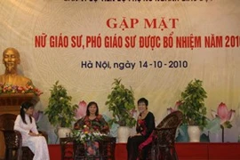 Các nữ giáo sư, phó giáo sư trong buổi giao lưu. (Ảnh: Phạm Mai/Vietnam+).