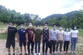 Các đối tượng nhập cảnh trái phép vào Việt Nam bị bắt giữ hôm 8/7. (Ảnh: TTXVN phát)