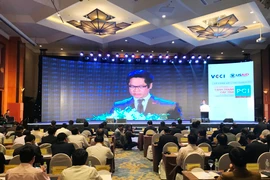 Lế công bố Chỉ số năng lực cạnh tranh cấp tỉnh - PCI 2017. (Ảnh: PV/Vietnam+)