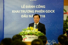 Bộ trưởng Bộ Tài chính Tiến Dũng phát biểu tại Lễ cồng đầu năm 2018. (Ảnh: HNX)