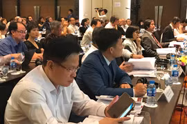 Công bố Báo cáo Thường niên Kinh tế Việt Nam 2018, với tựa đề “Hiểu thị trường lao động để tăng năng suất,” ngày 8/5. (Ảnh: PV/Vietnam+)