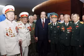 Quang cảnh buổi gặp gỡ. (Ảnh: Đinh Thuận/TTXVN)