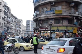 Cảnh yên bình của người dân Syria trên một tuyến phố ở Aleppo ngày 29/12. (Nguồn: EPA/TTXVN)