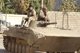 Quân đội Chính phủ Iraq trong cuộc chiến chống Is tại Mosul, Iraq ngày 10/12. (Nguồn: THX/TTXVN)