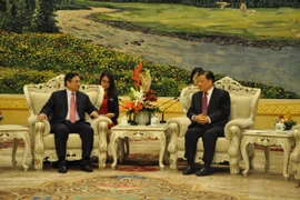 Đồng chí Lưu Vân Sơn, Ủy viên Thường vụ Bộ Chính trị, Bí thư Ban Bí thư Trung ương Đảng Cộng sản Trung Quốc, đã tiếp thân mật đồng chí Phạm Minh Chính và Đoàn đại biểu Đảng Cộng sản Việt Nam. (Ảnh: Tường Thu/Vietnam+)