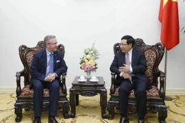 Phó Thủ tướng, Bộ trưởng Bộ Ngoại giao Phạm Bình Minh tiếp Bộ trưởng Văn phòng Tổng thống Ba Lan Krzysztof Szczerski. (Ảnh: An Đăng/TTXVN)