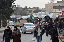 Cảnh yên bình của người dân Syria trên một tuyến phố ở Aleppo ngày 29/12. (Nguồn: EPA/TTXVN)
