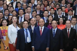 Thủ tướng Nguyễn Xuân Phúc với các đại biểu. (Ảnh: Thống Nhất/TTXVN)