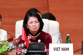 Phó Chủ tịch nước Đặng Thị Ngọc Thịnh và Đoàn đại biểu cấp cao Việt Nam dự Lễ khai mạc Hội nghị Cấp cao lần thứ 18 Phong trào Không liên kết. (Ảnh: Phương Hoa/TTXVN)
