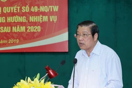 Ông Phan Đình Trạc, Bí thư Trung ương Đảng, Trưởng Ban Nội Chính trung ương, Trưởng Ban Chỉ đạo phát biểu khai mạc hội thảo. (Ảnh: Phương Hoa/TTXVN)