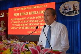 Ủy viên Bộ Chính trị, Phó Thủ tướng Thường trực Chính phủ Trương Hòa Bình, phát biểu tại Hội thảo. (Ảnh: Thanh Bình/TTXVN)