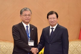 Phó Thủ tướng Trịnh Đình Dũng tiếp Phó Chủ tịch Hội đồng thúc đẩy Ngoại giao nhân dân Nhật Bản Onoi Yoshiki đang thăm và làm việc tại Việt Nam. (Ảnh: Văn Điệp/TTXVN)
