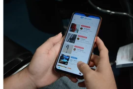 Giao diện ứng dụng 'Cho và Nhận." (Ảnh: Văn Dũng/TTXVN)