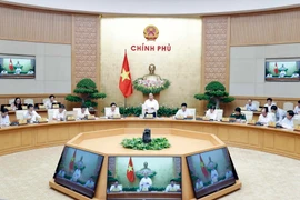 Thủ tướng Nguyễn Xuân Phúc phát biểu tại Phiên họp Chính phủ thường kỳ tháng Chín. (Ảnh: Thống Nhất/TTXVN)