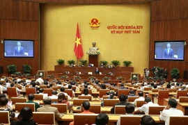 Bộ trưởng Bộ Công Thương Trần Tuấn Anh tiếp tục trả lời chất vấn. (Ảnh: Doãn Tấn/TTXVN)