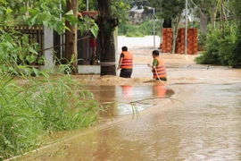 Lũ về đột ngột khiến nhiều hộ dân ở Bình Phước không kịp trở tay. (Ảnh: Đậu Tất Thành/TTXVN)