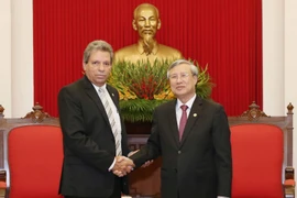 Ông Trần Quốc Vượng, Ủy viên Bộ Chính trị, Thường trực Ban Bí thư đã tiếp thân mật ông Victor Gaute Lopez, Bí thư Trung ương Đảng, Trưởng Ban Tư tưởng Trung ương Đảng Cộng sản Cuba. (Ảnh: Phương Hoa/TTXVN)