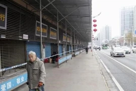 Cảnh vắng vẻ trên đường phố tại Vũ Hán, Trung Quốc, trong bối cảnh bùng phát các ca nhiễm virus corona, ngày 17/1/2020. (Ảnh: Kyodo/ TTXVN)