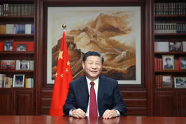 Chủ tịch Trung Quốc Tập Cận Bình đọc thông điệp chúc mừng năm mới 2020 tại Bắc Kinh. (Ảnh: THX/TTXVN)