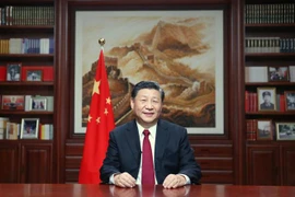 Chủ tịch Trung Quốc Tập Cận Bình đọc thông điệp chúc mừng năm mới 2020 tại Bắc Kinh. (Ảnh: THX/TTXVN)