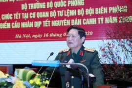 Bộ trưởng Bộ Quốc phòng Ngô Xuân Lịch phát biểu, chúc Tết lực lượng Bộ đội Biên phòng. (Ảnh: Lâm Khánh/TTXVN)