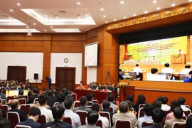 Quang cảnh hội nghị tại Trụ sở Bộ Tài chính (Hà Nội). (Ảnh: Phạm Hậu/TTXVN)