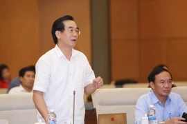 Ông Nguyễn Hữu Vạn, Tổng Kiểm toán Nhà nước trình bày tờ trình. (Ảnh: Phương Hoa/TTXVN)