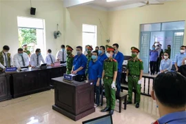 Các bị cáo tại phiên xét xử ngày 26/10. (Ảnh: TTXVN phát)