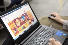 phiên chợ online đầu tiên của Sàn thương mại điện tử hàng Việt Nam chất lượng cao. (Ảnh minh họa: Mỹ Phương/TTXVN)