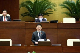 Bộ trưởng Bộ Tài chính Hồ Đức Phớc phát biểu giải trình, làm rõ một số vấn đề đại biểu Quốc hội nêu. (Ảnh: Phạm Kiên/TTXVN)