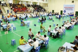 Tiêm vaccine phòng COVID-19 mũi 1 cho công nhân lao động tại Quảng Ninh. (Ảnh: TTXVN phát)