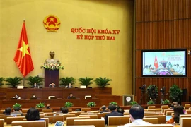 Đại biểu Quốc hội thảo luận trực tuyến về dự án Luật sửa đổi, bổ sung một số điều của Luật Thống kê. (Ảnh: Văn Điệp/TTXVN)