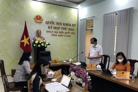 Đại biểu Quốc hội tỉnh Kiên Giang thảo luận chiều 29/10. (Ảnh: TTXVN phát)