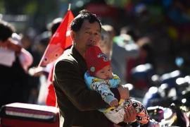 Trẻ sơ sinh Trung Quốc tại bệnh viện nhi đồng ở Bắc Kinh ngày 30/10. (Nguồn: AFP/TTXVN)