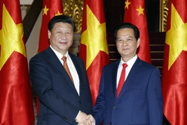 Thủ tướng Nguyễn Tấn Dũng hội kiến Tổng Bí thư, Chủ tịch nước Trung Quốc Tập Cận Bình thăm cấp Nhà nước Việt Nam. (Ảnh: Đức Tám/TTXVN)