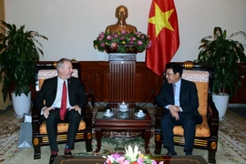 Phó Thủ tướng, Bộ trưởng Bộ Ngoại giao Phạm Bình Minh tiếp Đại sứ Hoa Kỳ tại Việt Nam Ted Osius. (Ảnh: Phạm Kiên/TTXVN)