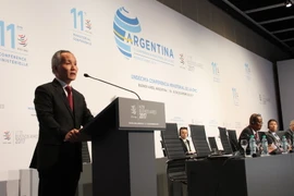 Thứ trưởng Bộ Công Thương Việt Nam Trần Quốc Khánh phát biểu trong phiên họp toàn thể Hội nghị Bộ trưởng Tổ chức Thương mại Thế giới (WTO) lần thứ 11 (Ảnh: Phương Lan/Vietnam+)