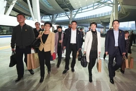 Các đại biểu của tỉnh An Huy tới thủ đô Bắc Kinh tham dự Đại hội, ngày 15/10. (Nguồn: THX/TTXVN)