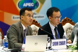 Đoàn Chủ tịch điều hành hội nghị. (Ảnh: An Đăng/TTXVN)