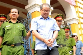 Bị cáo Phạm Công Danh được dẫn đến tòa để tuyên án phúc thẩm ngày 24/1. (Ảnh: An Hiếu/TTXVN) 