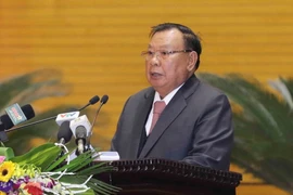 Tổng Bí thư, Chủ tịch nước Lào Bounnhang Vorachith nói chuyện với các đại biểu. (Ảnh: Phương Hoa/TTXVN)
