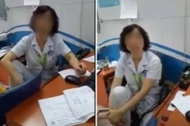 Bác sỹ gác chân lên ghế. (Ảnh cắt từ clip)