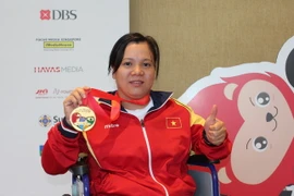 Vận động viên cử tạ Đặng Thị Linh Phượng. (Ảnh: Lê Hải-Việt Hải/Vietnam+)