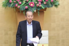 Phó Thủ tướng Thường trực Trương Hòa Bình chủ trì buổi làm việc. (Ảnh: Văn Điệp/TTXVN)