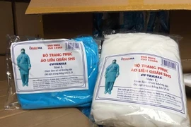 Số hàng nghi giả mạo bị cơ quan chức năng phát hiện, thu giữ. (Ảnh: TTXVN phát)